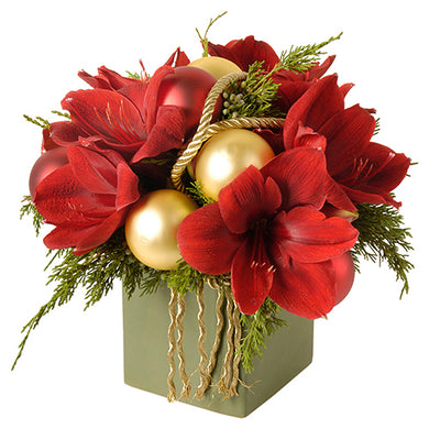Modern assortment of red amaryllis and winter greens with red and gold decorative holiday accents in Flower Studio signature style available for Christmas.